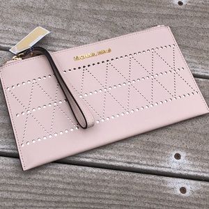 NWT Michael Kors perforated zip wristlet